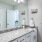 a bathroom with a granite counter top