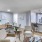 a living room with tables and chairs